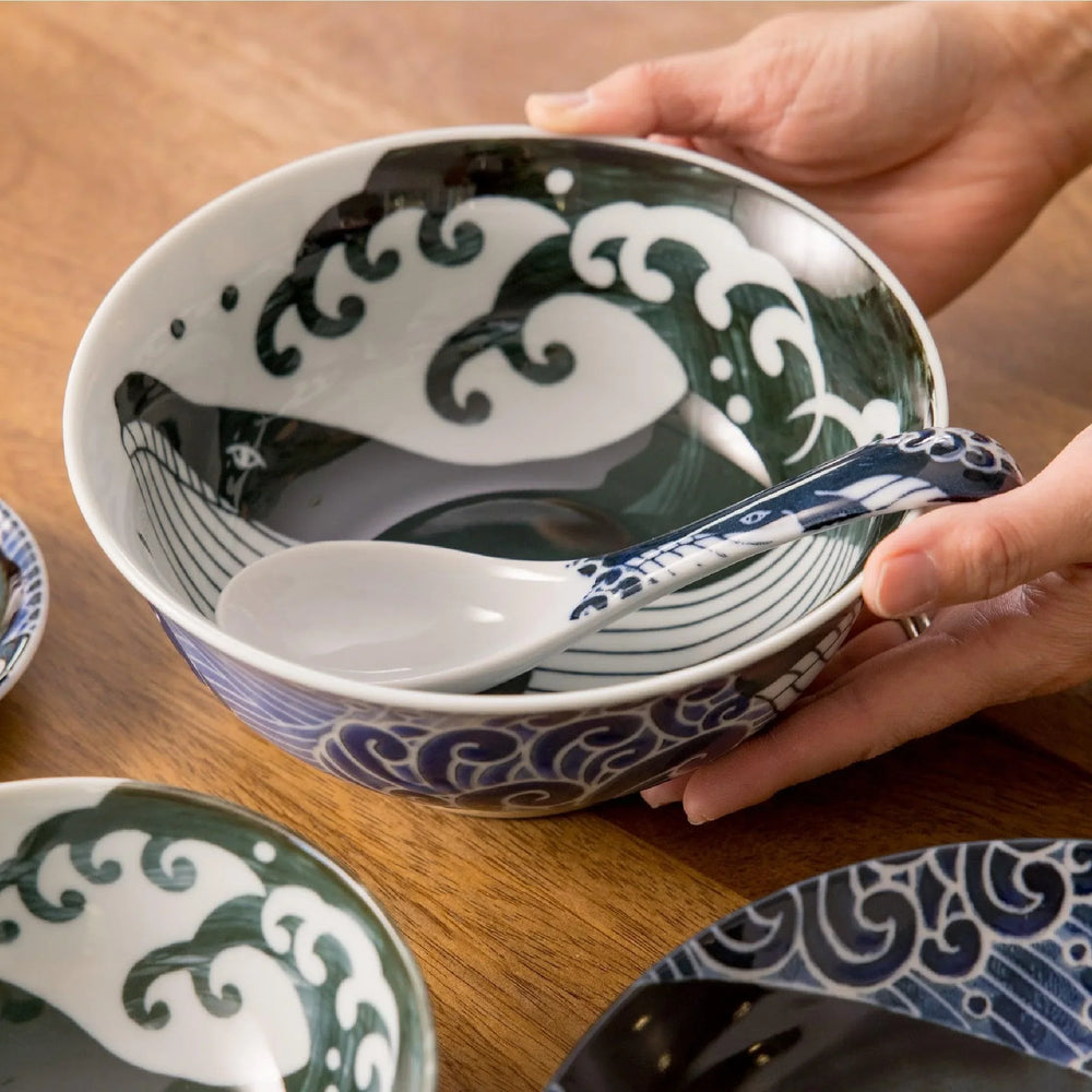 Handcrafted ceramic ramen bowl featuring a beautiful wave design, perfect for enjoying your favorite noodle dishes.