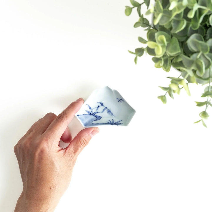 Mt. Fuji-shaped plate with a blue landscape design.