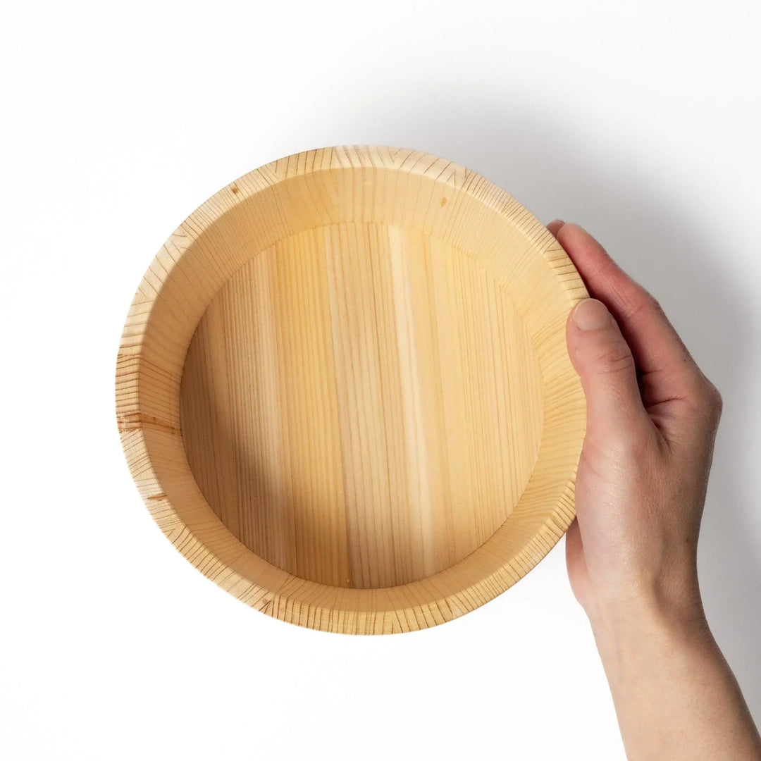Wooden rice container with lid, ideal for storing and serving freshly cooked Japanese rice.