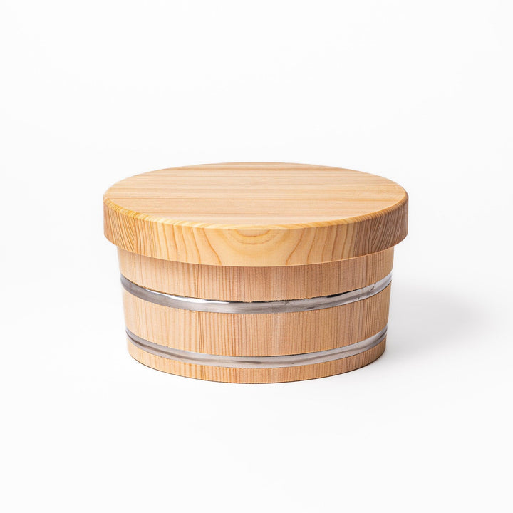 Wooden rice container with lid, ideal for storing and serving freshly cooked Japanese rice.