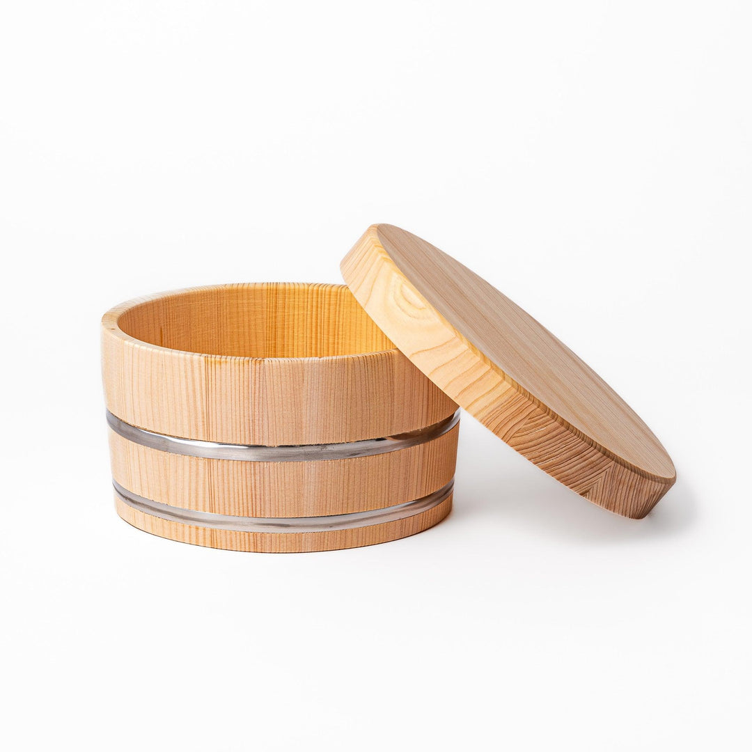 Wooden rice container with lid, ideal for storing and serving freshly cooked Japanese rice.