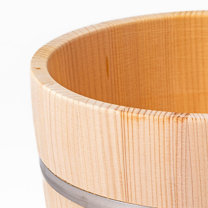 Wooden rice container with lid, ideal for storing and serving freshly cooked Japanese rice.