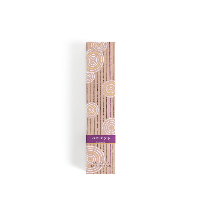 Japanese Palo Santo incense sticks neatly arranged in a wooden box with a decorative paper sleeve from Kyoto’s Kousaido
