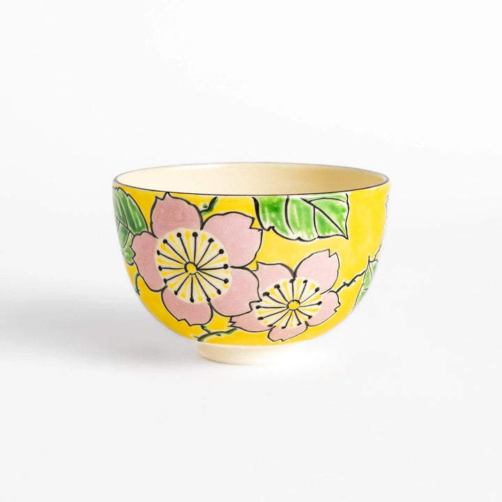 Yellow matcha bowl handcrafted with nature-inspired design, ideal for enjoying Japanese tea. (114)