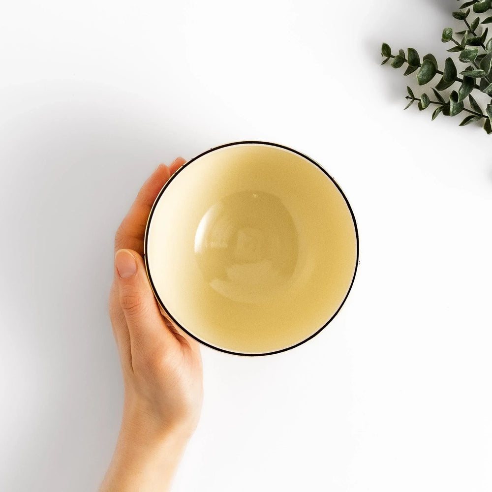 Yellow matcha bowl handcrafted with nature-inspired design, ideal for enjoying Japanese tea. (114)