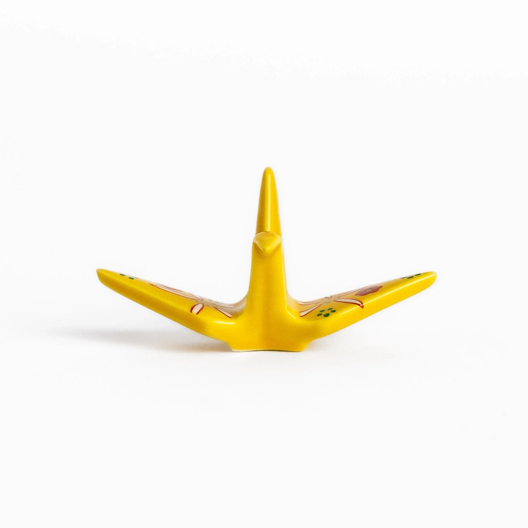 Yellow origami crane incense holder with floral motifs perfect for bringing charm and serenity to any space.