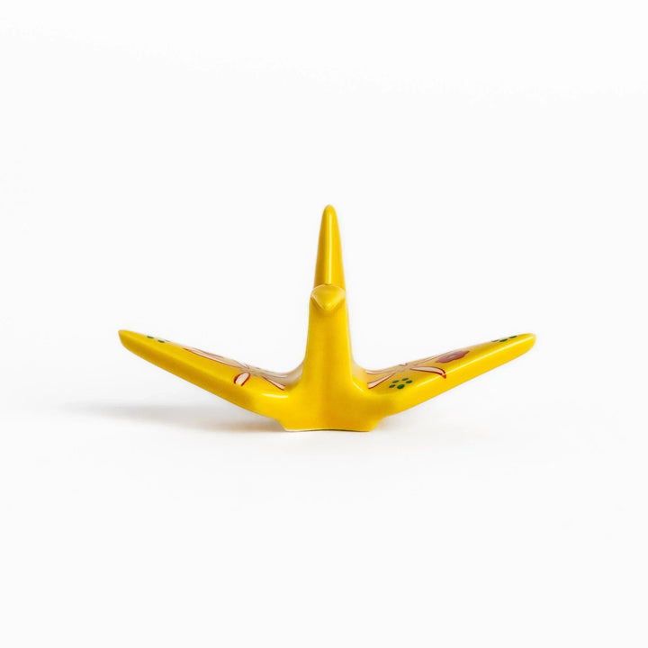Yellow origami crane incense holder with floral motifs perfect for bringing charm and serenity to any space.