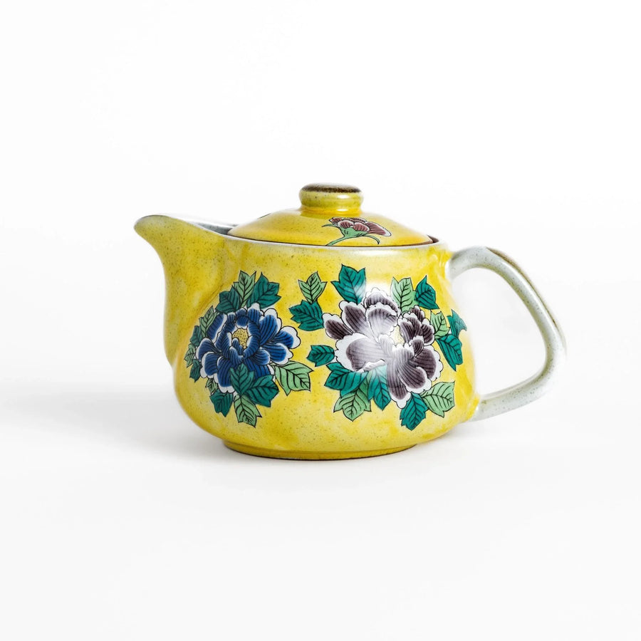 Vibrant yellow teapot adorned with colorful peony flowers, perfect for adding a touch of elegance and charm to your tea time.